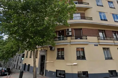 Kitchen; kitchen appliances, wood floor, natural light, modern style
