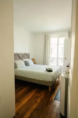 Kitchen; kitchen appliances, wood floor, natural light, modern style
