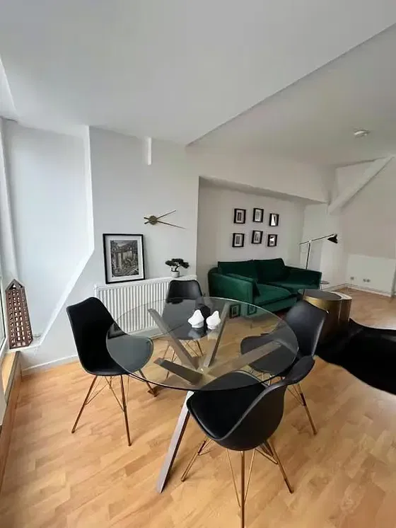 Kitchen; kitchen appliances, wood floor, natural light, modern style