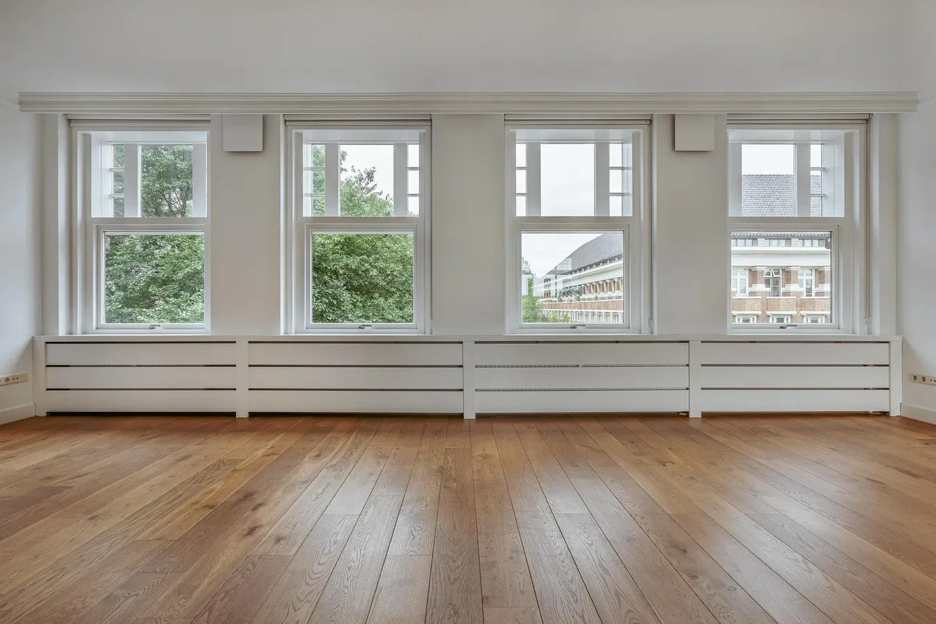 Kitchen; kitchen appliances, wood floor, natural light, modern style
