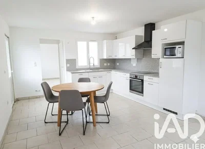 Kitchen; kitchen appliances, wood floor, natural light, modern style