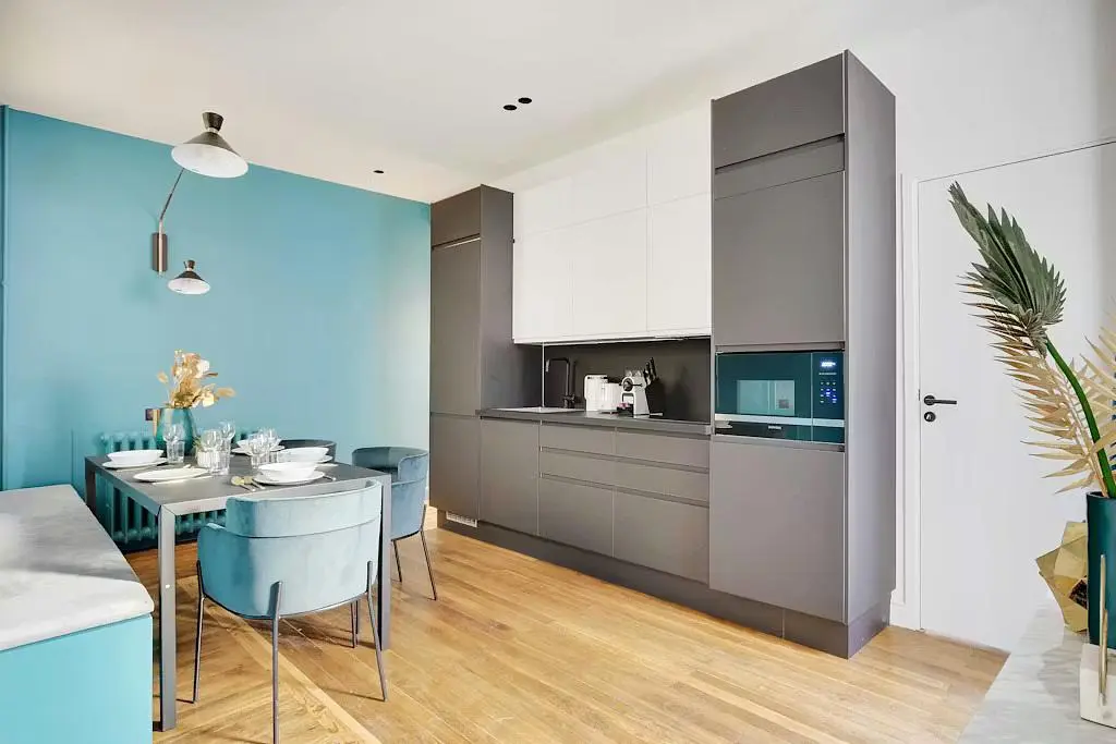 Kitchen; kitchen appliances, wood floor, natural light, modern style