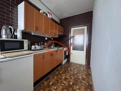 Kitchen; kitchen appliances, wood floor, natural light, modern style