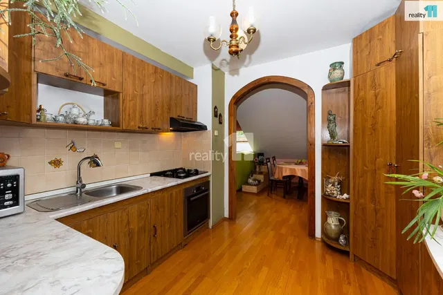 Kitchen; kitchen appliances, wood floor, natural light, modern style