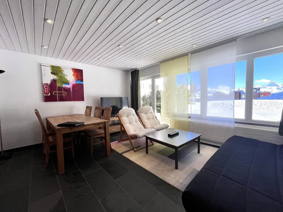 Kitchen; kitchen appliances, wood floor, natural light, modern style