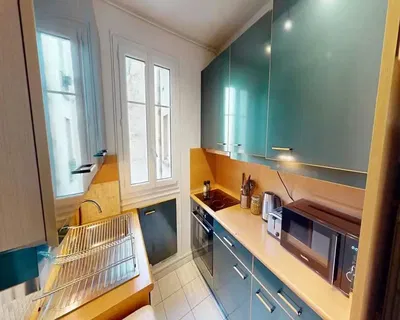 Kitchen; kitchen appliances, wood floor, natural light, modern style