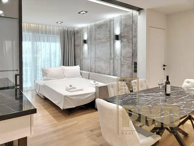 Kitchen; kitchen appliances, wood floor, natural light, modern style