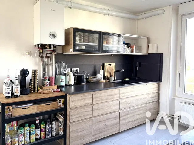 Kitchen; kitchen appliances, wood floor, natural light, modern style