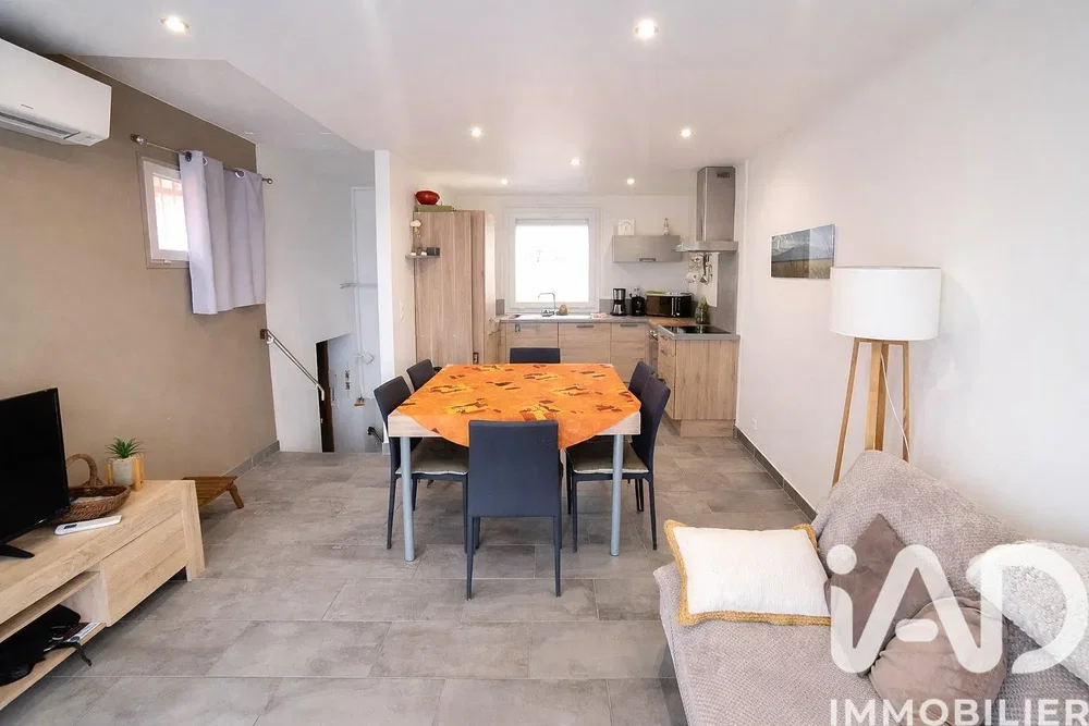 Kitchen; kitchen appliances, wood floor, natural light, modern style