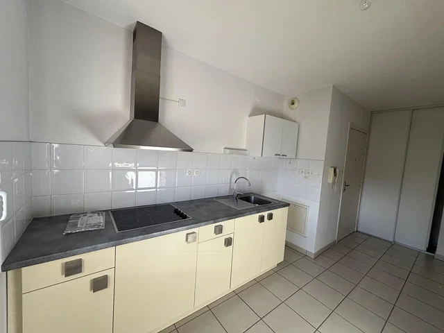 Kitchen; kitchen appliances, wood floor, natural light, modern style