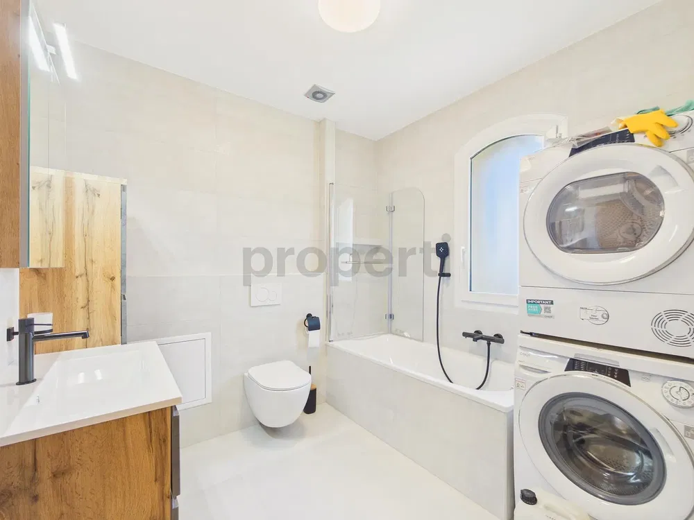 Kitchen; kitchen appliances, wood floor, natural light, modern style
