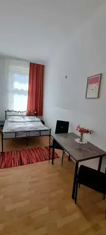 Kitchen; kitchen appliances, wood floor, natural light, modern style