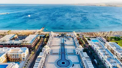 Kitchen; kitchen appliances, wood floor, natural light, modern style