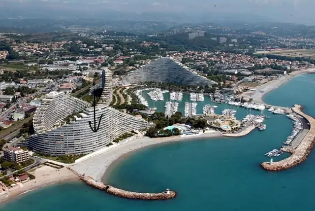 Kitchen; kitchen appliances, wood floor, natural light, modern style