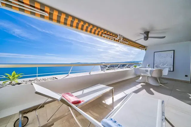 Kitchen; kitchen appliances, wood floor, natural light, modern style