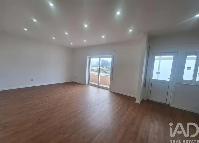 Kitchen; kitchen appliances, wood floor, natural light, modern style