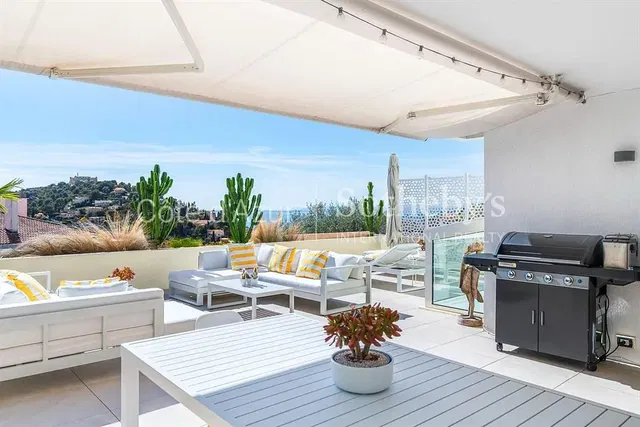 Kitchen; kitchen appliances, wood floor, natural light, modern style