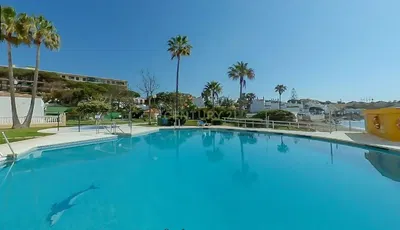 Kitchen; kitchen appliances, wood floor, natural light, modern style