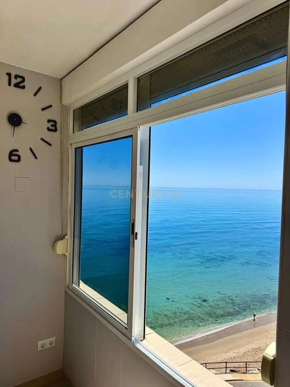 Kitchen; kitchen appliances, wood floor, natural light, modern style