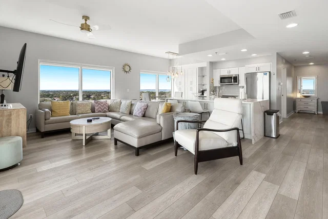 Kitchen; kitchen appliances, wood floor, natural light, modern style