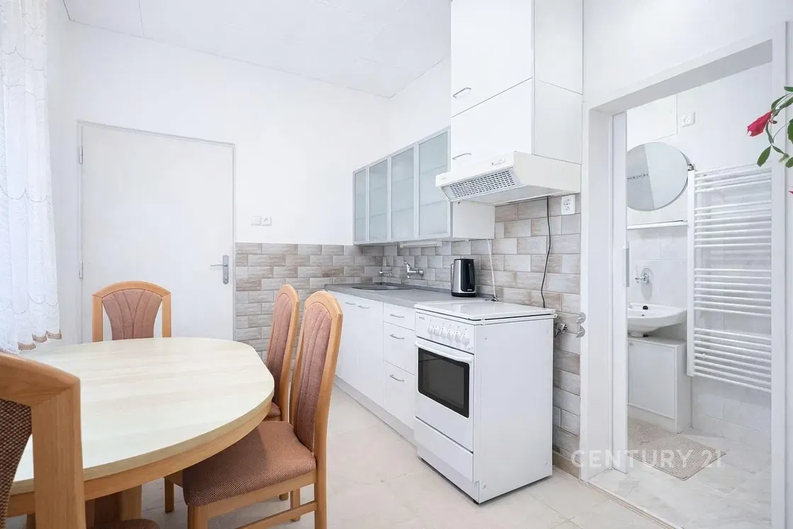 Kitchen; kitchen appliances, wood floor, natural light, modern style
