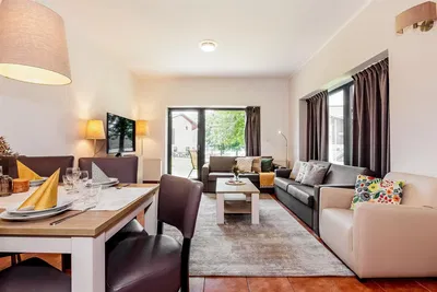 Kitchen; kitchen appliances, wood floor, natural light, modern style