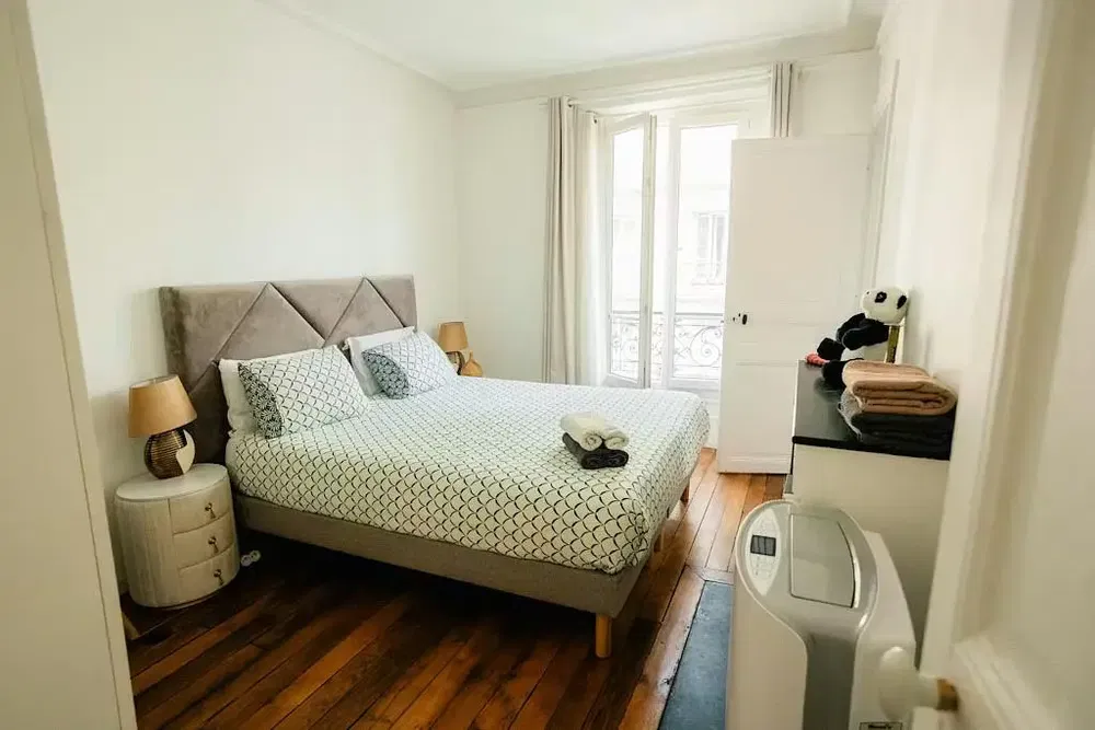 Kitchen; kitchen appliances, wood floor, natural light, modern style