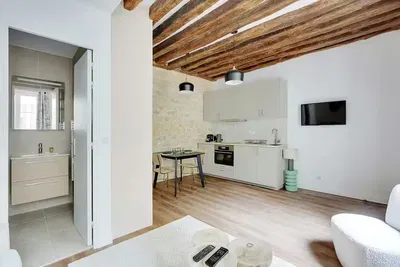 Kitchen; kitchen appliances, wood floor, natural light, modern style