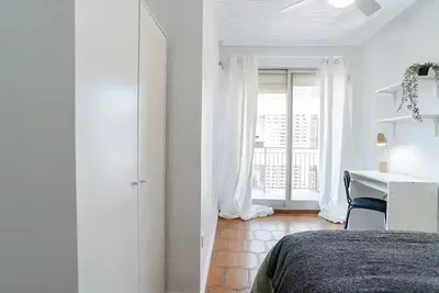 Kitchen; kitchen appliances, wood floor, natural light, modern style