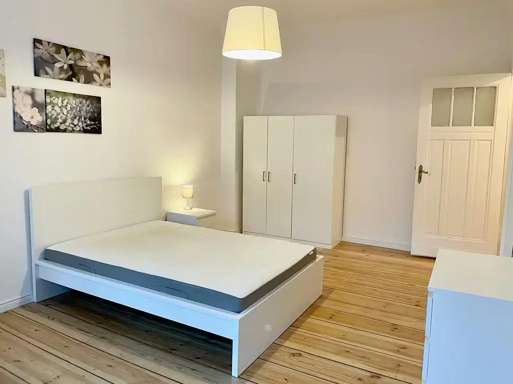 Kitchen; kitchen appliances, wood floor, natural light, modern style