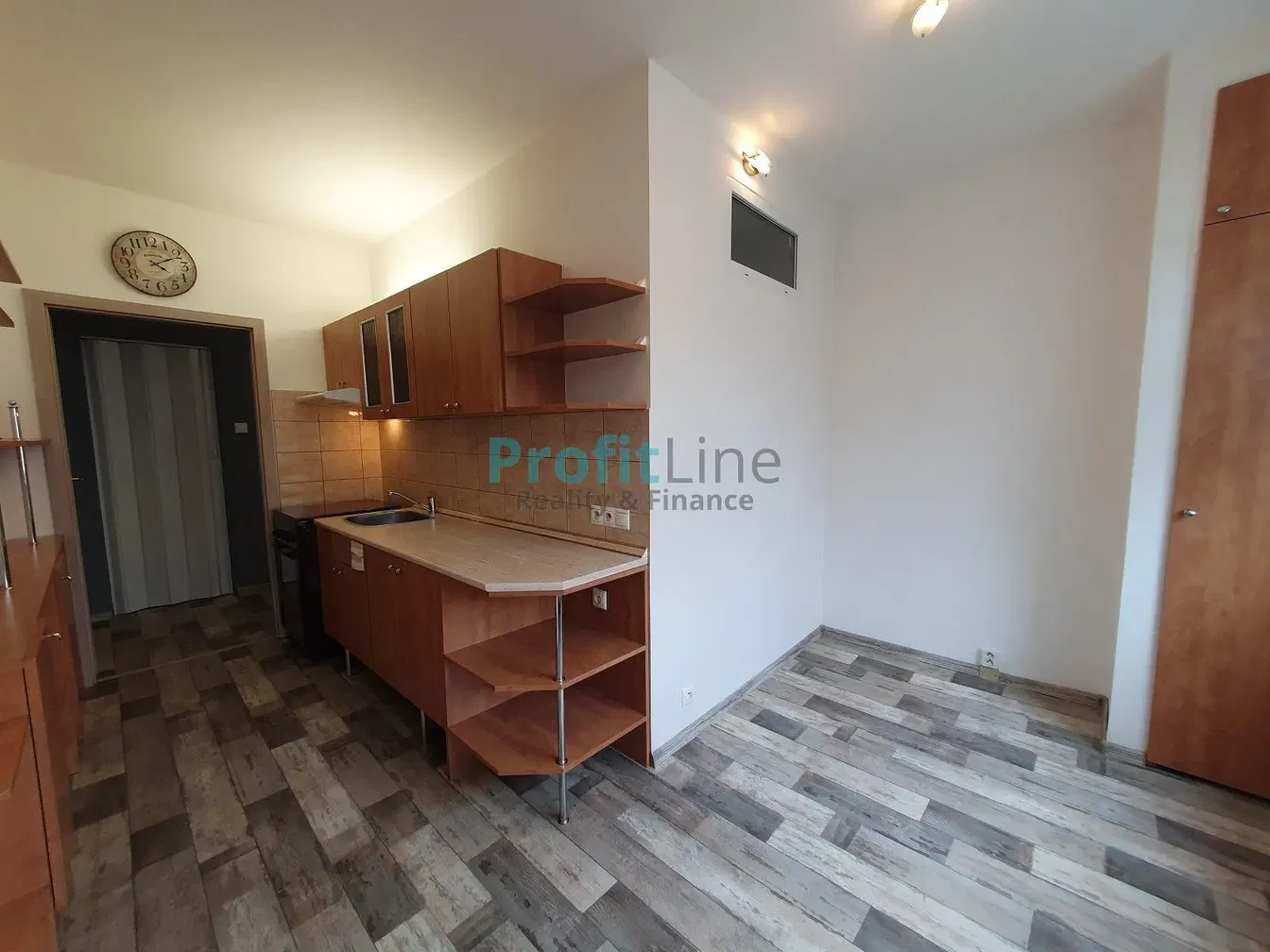 Kitchen; kitchen appliances, wood floor, natural light, modern style