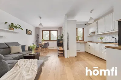 Soggiorno; pavimento in legno, luce naturale, stile moderno