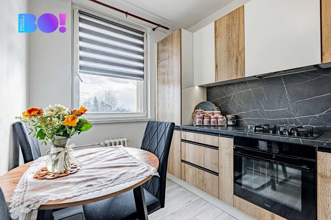 Kitchen; kitchen appliances, wood floor, natural light, modern style