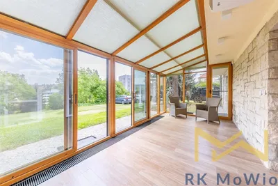 Kitchen; kitchen appliances, wood floor, natural light, modern style