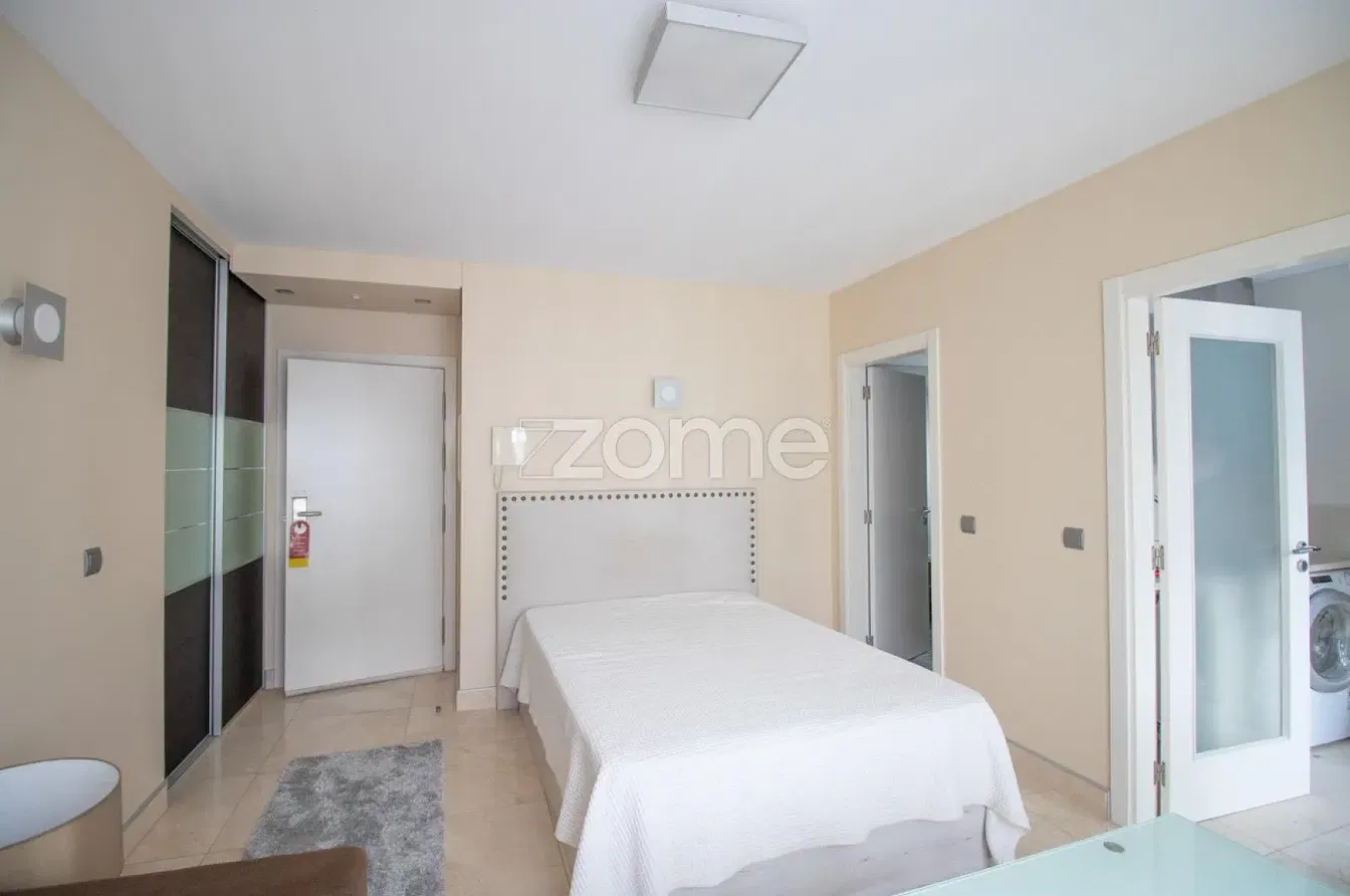 Kitchen; kitchen appliances, wood floor, natural light, modern style