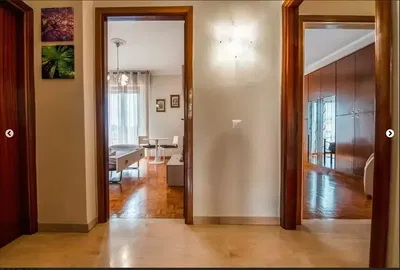 Kitchen; kitchen appliances, wood floor, natural light, modern style