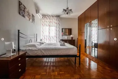 Kitchen; kitchen appliances, wood floor, natural light, modern style