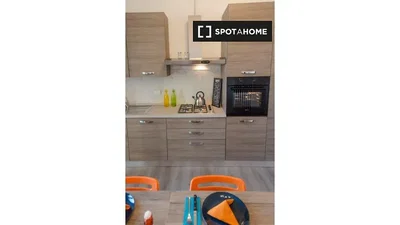 Kitchen; kitchen appliances, wood floor, natural light, modern style