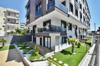 Kitchen; kitchen appliances, wood floor, natural light, modern style