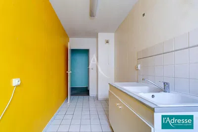 Kitchen; kitchen appliances, wood floor, natural light, modern style