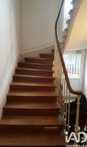 Kitchen; kitchen appliances, wood floor, natural light, modern style