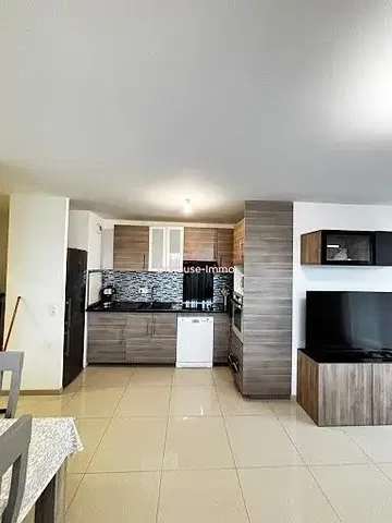 Kitchen; kitchen appliances, wood floor, natural light, modern style