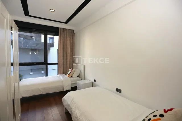 Cocina; electrodomésticos, suelo de madera, luz natural, estilo moderno