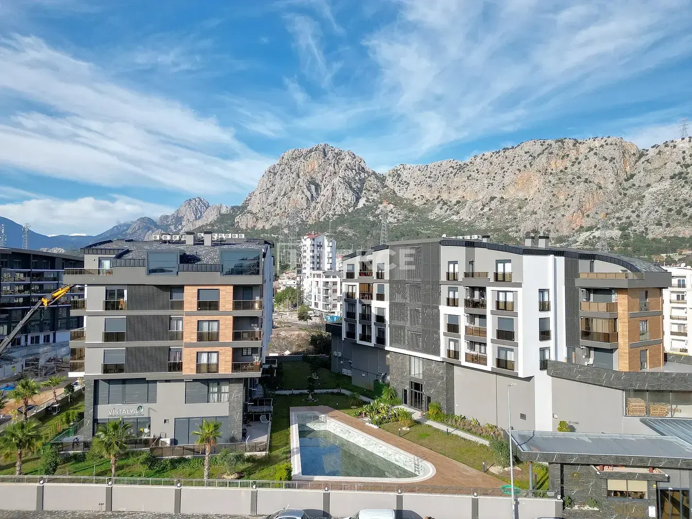 Kitchen; kitchen appliances, wood floor, natural light, modern style