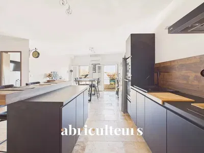 Kitchen; kitchen appliances, wood floor, natural light, modern style