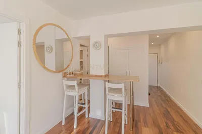 Kitchen; kitchen appliances, wood floor, natural light, modern style