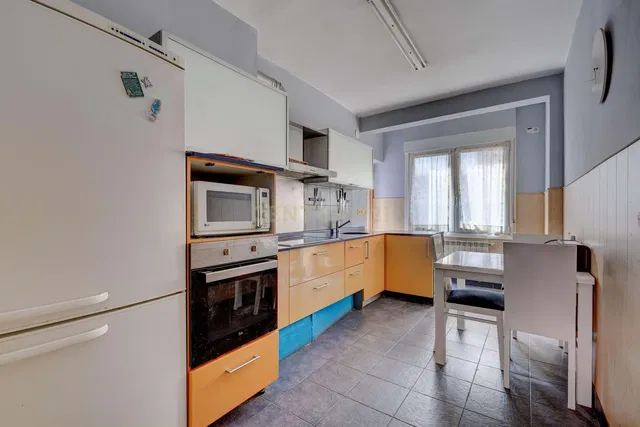 Kitchen; kitchen appliances, wood floor, natural light, modern style