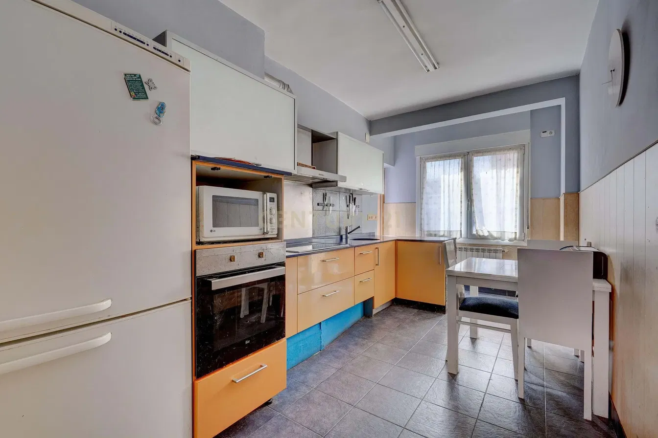Kitchen; kitchen appliances, wood floor, natural light, modern style