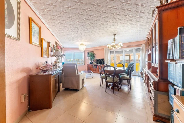 Kitchen; kitchen appliances, wood floor, natural light, modern style