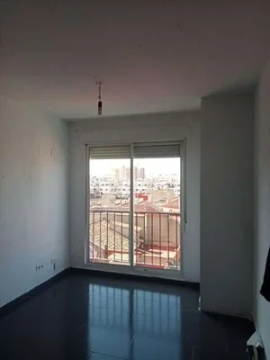Cocina; electrodomésticos, suelo de madera, luz natural, estilo moderno